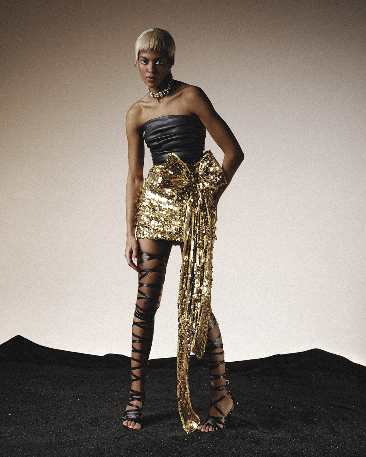 Shiny mini skirt with a bow (SKU 763/12)