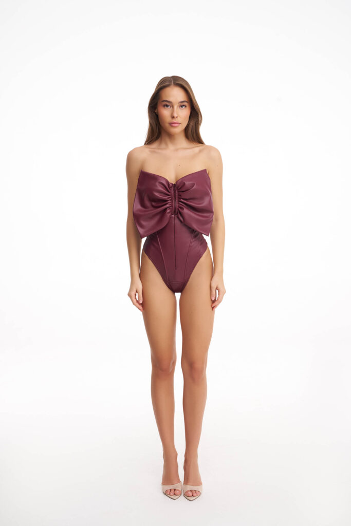 Burgundy corset bodysuit with a bow
